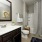 Bathroom with large vanity and a bathtub