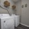 Washer and dryer with storage shelf